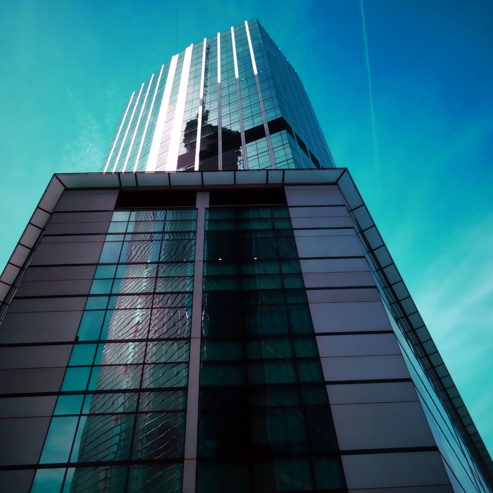 a tall building with glass windows